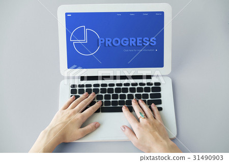 Hands working on laptop network graphic overlay Hands working on laptop network graphic overlay 31490903