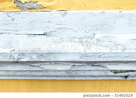 cracked yellow paint color concrete wall 31492029