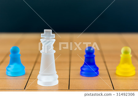 Chess glass on a wood chessboard Chess glass on a wood chessboard 31492306