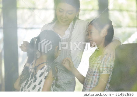 a picture of mom and two kids talking and smiling a picture of mom and two kids talking and smiling 31492686