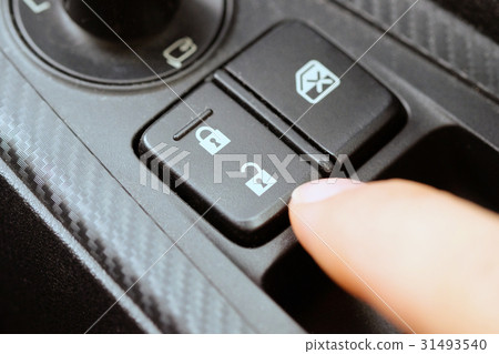 image of hand push the car lock button. 31493540