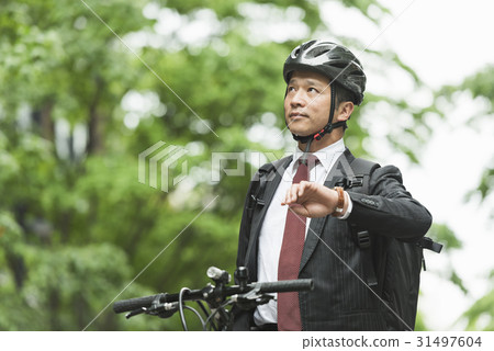 Middle businessman bicycle Middle businessman bicycle 31497604
