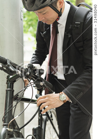 Middle businessman bicycle Middle businessman bicycle 31498040