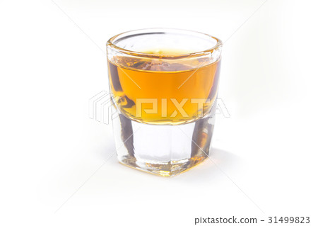 Whiskey shot on white background. 31499823