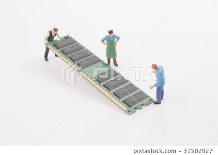 Miniature engineers with  circuit board. Miniature engineers with  circuit board. 31502027
