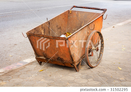 Street orange cart. Street cleaning service Street orange cart. Street cleaning service 31502295