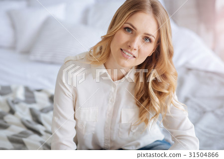 Beautiful fair-haired young woman looking at the Beautiful fair-haired young woman looking at the 31504866