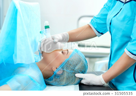 Young woman undergoing surgery at the hospital 31505535