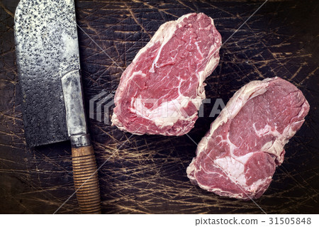 Dry Aged Entrecote on old Wooden Board 31505848