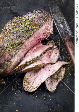 Barbecue Haunch of Venison on old Metal Sheet Barbecue Haunch of Venison on old Metal Sheet 31505877