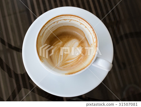hot coffee latte in a white cup hot coffee latte in a white cup 31507081
