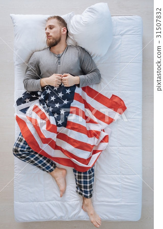 Handsome American citizen being asleep Handsome American citizen being asleep 31507832