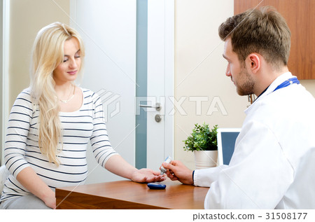 Doctor measuring of blood sugar for diabetes Doctor measuring of blood sugar for diabetes 31508177