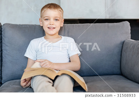 Enthusiastic active kid enjoying his hobby Enthusiastic active kid enjoying his hobby 31508933
