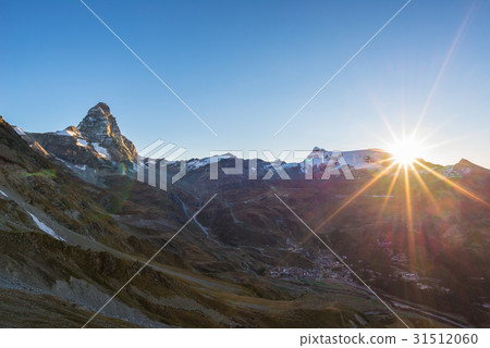 Aerial view at sunrise of Breuil Cervinia village Aerial view at sunrise of Breuil Cervinia village 31512060
