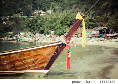 Thai traditional boats on Phi-Phi Islands,Thailand Thai traditional boats on Phi-Phi Islands,Thailand 31512328