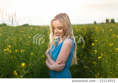 Young beautiful woman in the fields 31513053