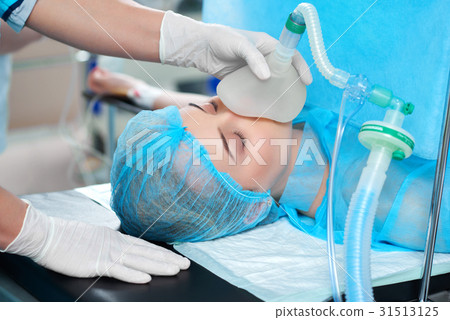 Female patient undergoing surgery 31513125
