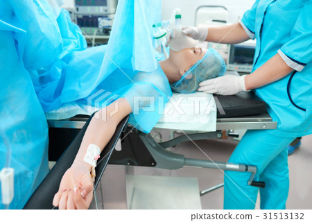 Female patient undergoing surgery 31513132