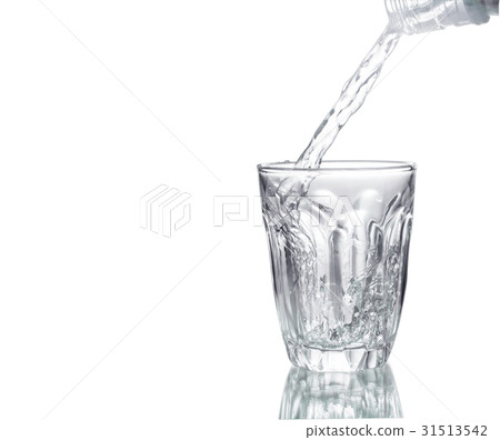 Water poured in a glass transparent 31513542