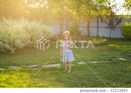 Funny child with candy lollipop, happy little girl Funny child with candy lollipop, happy little girl 31515691