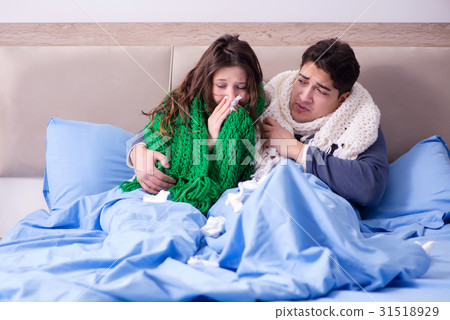 Sick wife and husband in bed in home 31518929