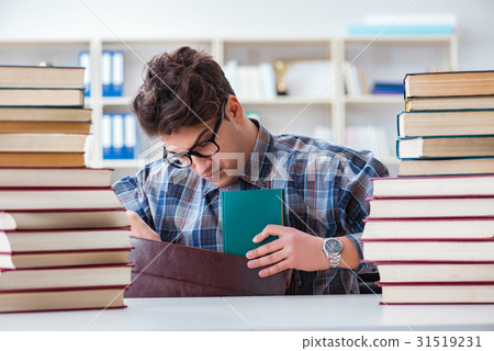 Nerd funny student preparing for university exams Nerd funny student preparing for university exams 31519231