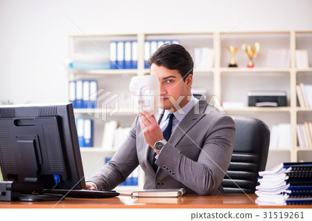 Businessman with mask in office hypocrisy concept 31519261