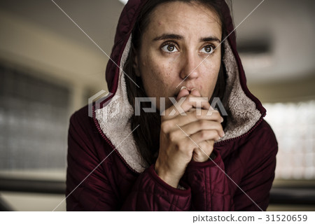 Cold Hopeless Woman Sitting Thoughtful Cold Hopeless Woman Sitting Thoughtful 31520659