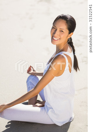 Portrait of beautiful woman performing yoga Portrait of beautiful woman performing yoga 31522541