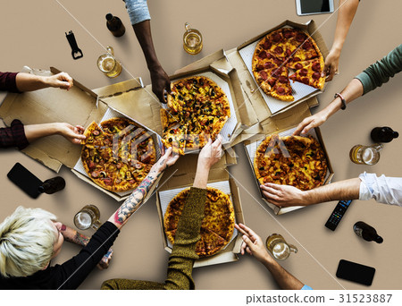 Group of poeple enjoy the italian cuisine pizza Group of poeple enjoy the italian cuisine pizza 31523887