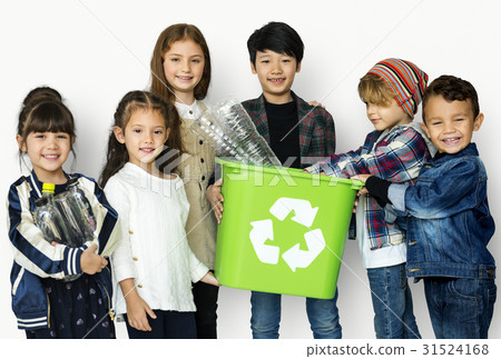 Kids and plastic bottles in a recycle bin 31524168