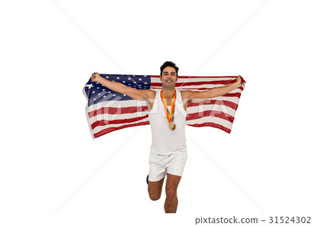 Athlete posing with gold medals and american flag after victory Athlete posing with gold medals and american flag after victory 31524302