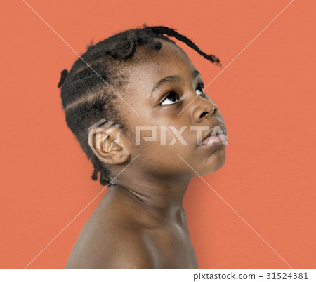 African Descent Boy Looks Up Focused Concentrated African Descent Boy Looks Up Focused Concentrated 31524381