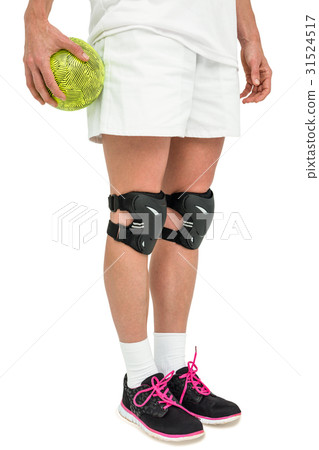 Sportswoman holding a ball 31524517