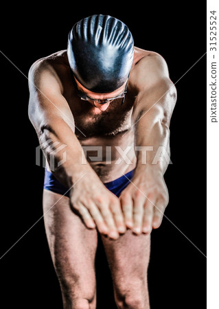 Swimmer preparing to dive Swimmer preparing to dive 31525524