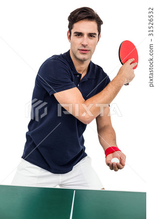 Confident male athlete playing table tennism 31526532