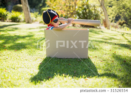 Boy pretending to be a pirate Boy pretending to be a pirate 31526554