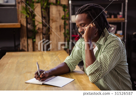 Man making a phone call Man making a phone call 31526587