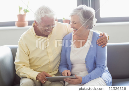 Senior couple using a tablet Senior couple using a tablet 31526816