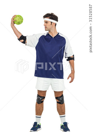 Sportsman posing with ball on white background 31528587