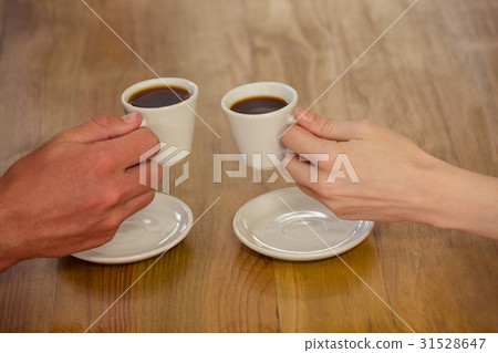 Couple cheering with espresso 31528647