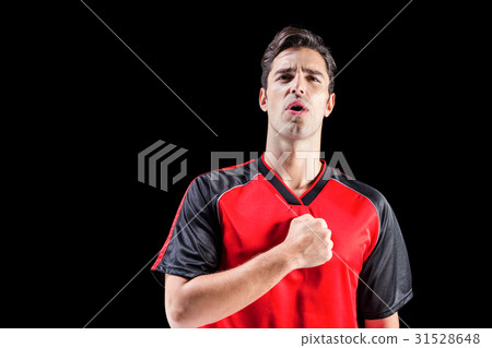 Athlete showing respect during national anthem 31528648