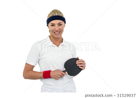 Female athlete holding table tennis paddle Female athlete holding table tennis paddle 31529037