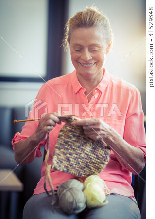 Senior woman knitting wool 31529348