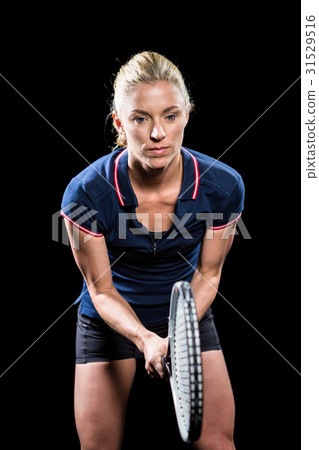 Tennis player playing tennis with a racket Tennis player playing tennis with a racket 31529516
