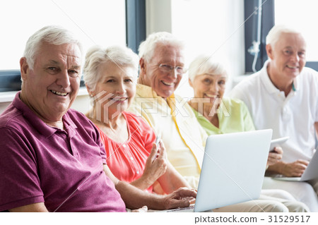 Seniors using technology Seniors using technology 31529517