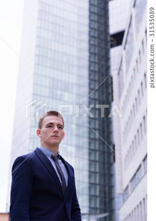 A business man portrait outdoors A business man portrait outdoors 31535089