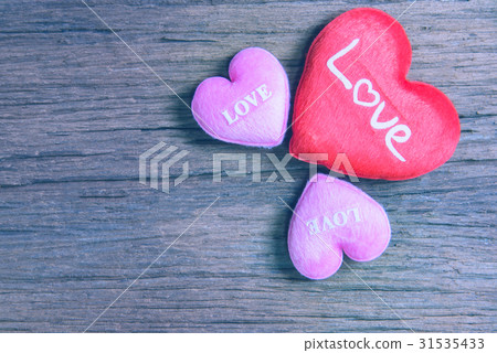 Heart on wooden table Heart on wooden table 31535433