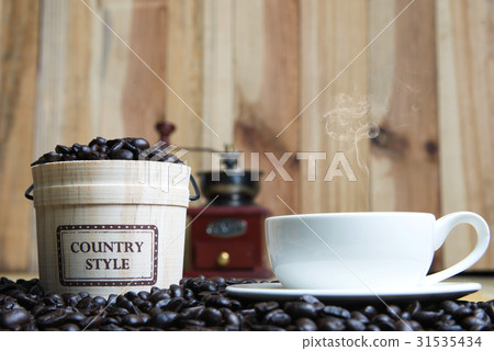 Coffee cup and Coffee beans with casks Coffee cup and Coffee beans with casks 31535434